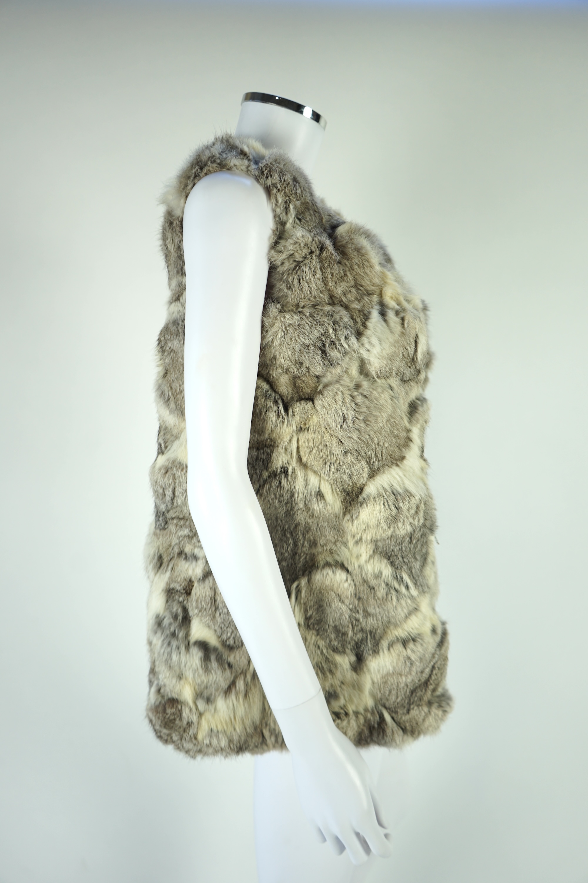 A selection of fur scarves and a fur gilet